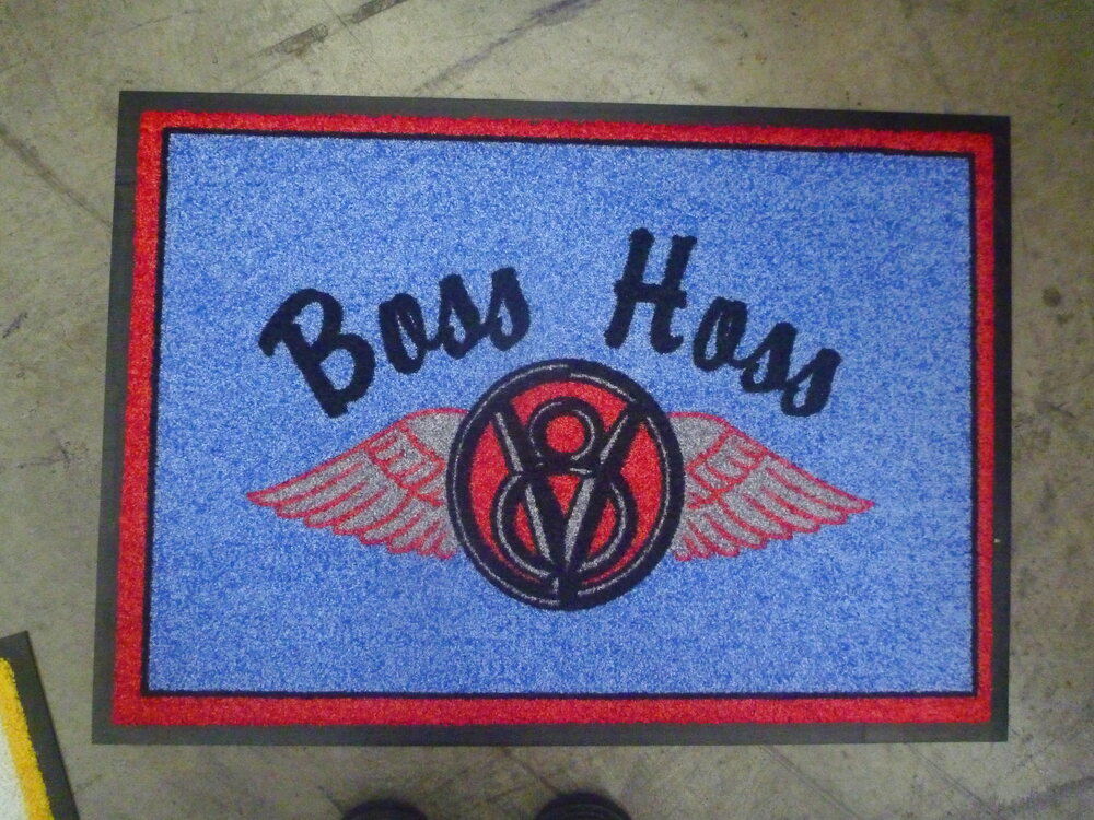 Blue Boss Hoss doormat with a winged V8 badge