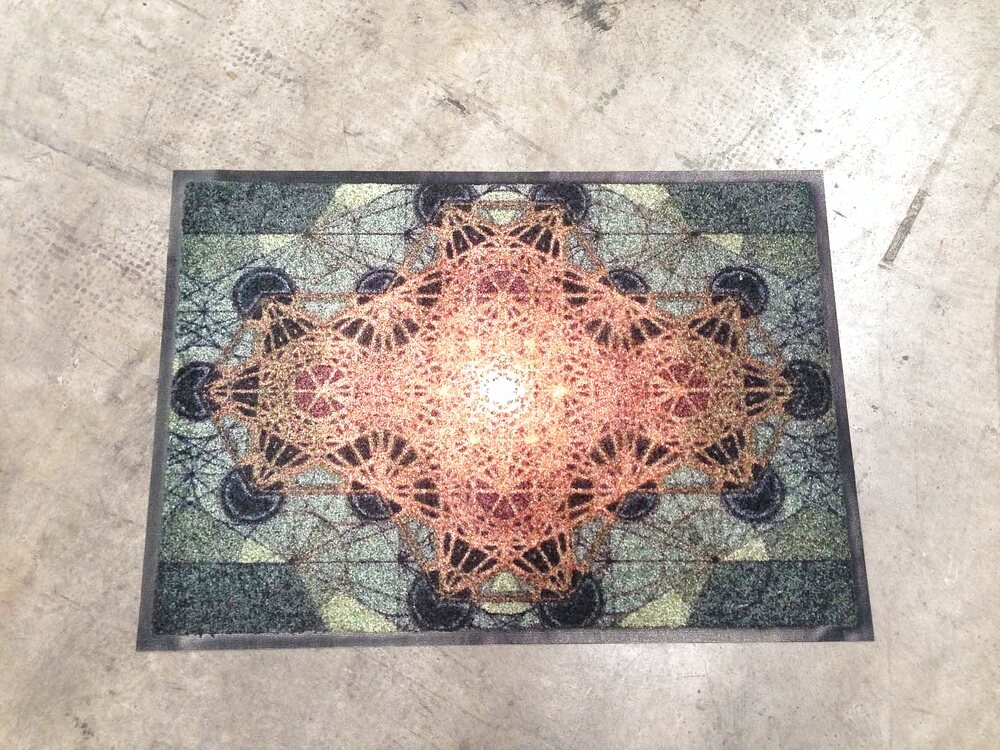 Doormat printed with an ornate geometric medallion pattern